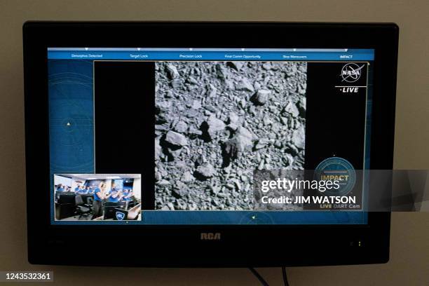 Television at NASA's Kennedy Space Center in Cape Canaveral, Florida, captures the final images from the Double Asteroid Redirection Test as it...