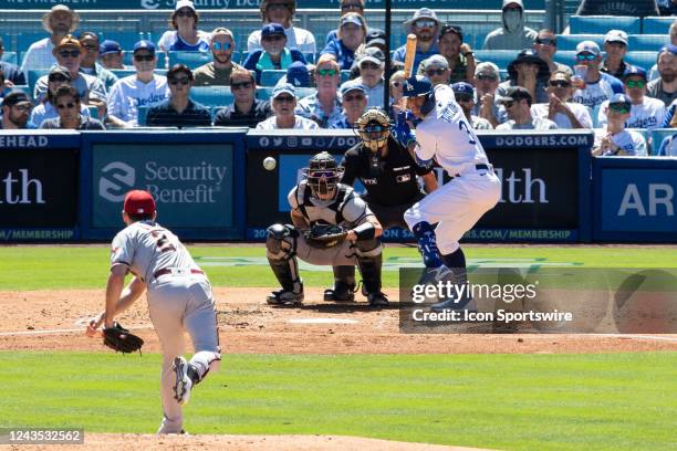 Arizona Diamondbacks starting pitcher Zach Davies pitches the ball to Los Angeles Dodgers second basemen Chris Taylor in the third inning during game...