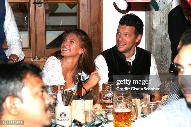Michael Ballack and his girlfriend Sophia Schneiderhan during the 187th Oktoberfest at Kaefer-Schaenke /Theresienwiese on September 26, 2022 in...