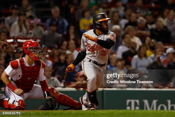 Cedric Mullins of the Baltimore Orioles hits a two-run triple in the second inning against the Boston Red Sox at Fenway Park on September 26, 2022 in...