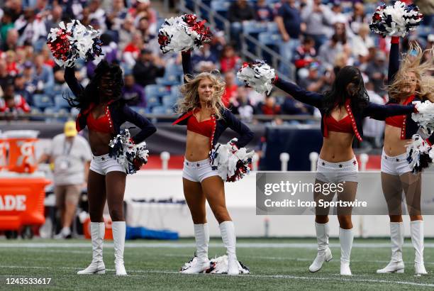 Patriots cheerleaders entertain before a game between the New England Patriots and the Baltimore Ravens on September 25 at Gillette Stadium in...