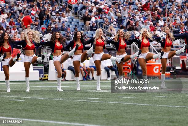 Patriots cheerleaders perform before a game between the New England Patriots and the Baltimore Ravens on September 25 at Gillette Stadium in...