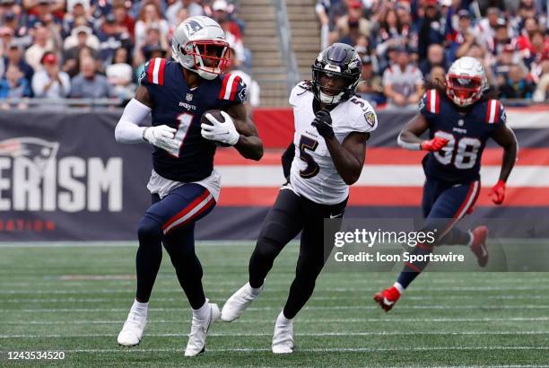 Baltimore Ravens cornerback Jalyn Armour-Davis chases New England Patriots wide receiver DeVante Parker during a game between the New England...