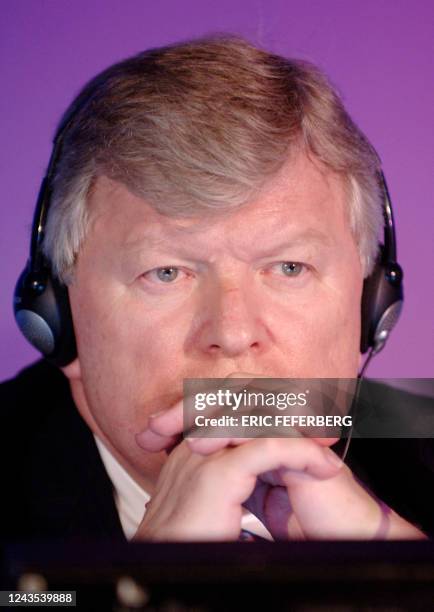 Gemplus president Alex Mandl listens during a press conference in Paris 07 December 2005. Smart-card makers Gemplus and Axalto said on Wednesday that...