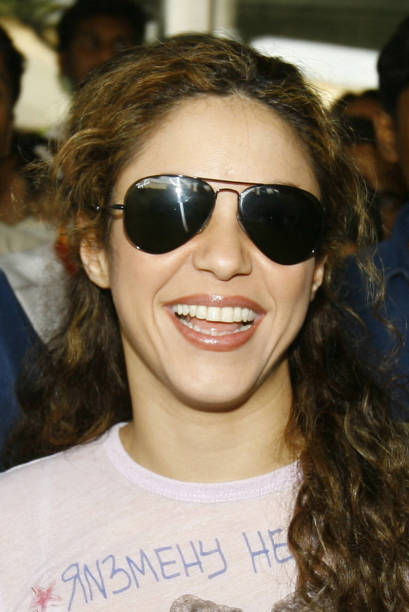 Colombian singer Shakira smiles as she leaves the arrivals hall of Chattrapati Shivaji International Airport in Mumbai, 24 March 2007. The multiple...