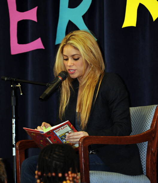 Colombian pop star Shakira reads to children at Oyster-Adams Bilingual Elementry School in Washington on January 19, 2009 where she announced a...