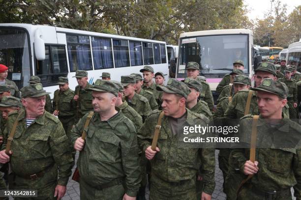 Reservists drafted during the partial mobilisation attend a departure ceremony in Sevastopol, Crimea, on September 27, 2022. - Russian President...
