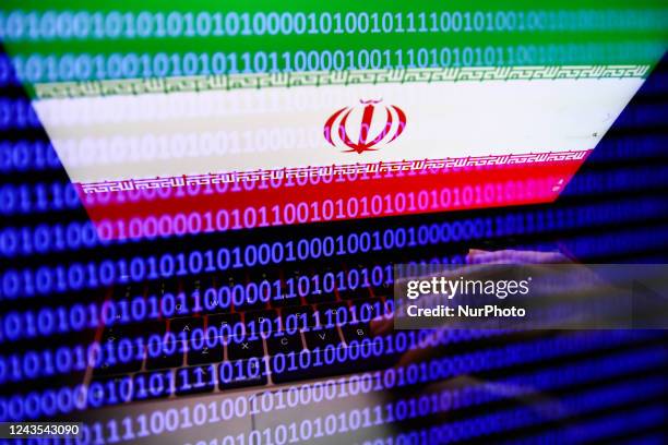 Flag of Iran displayed on a laptop screen and binary code displayed on a screen are seen in this multiple exposure illustration photo taken in...