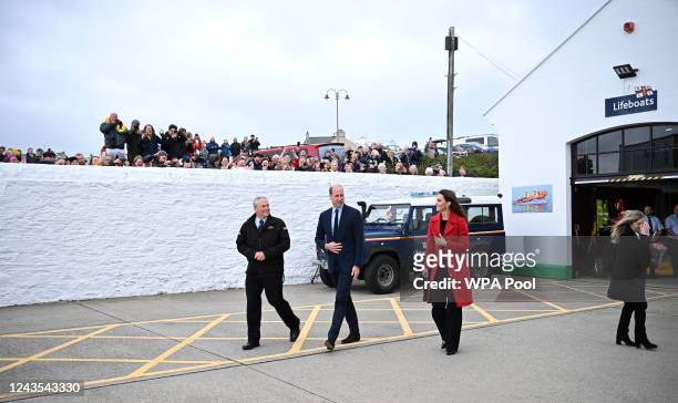 Prince William, Prince of Wales and Catherine, Princess of Wales during their visit to the RNLI Holyhead Lifeboat Station, during a visit to Wales on...