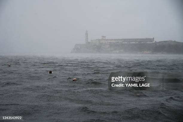 View of the Morro castle in Havana on September 27 during the passage of hurricane Ian. Hurricane Ian made landfall in western Cuba early Tuesday,...