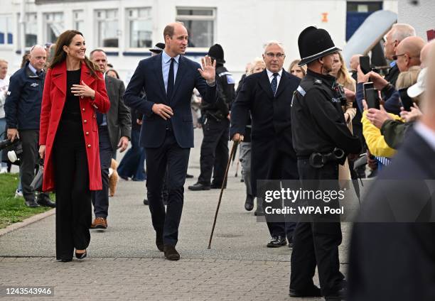 Prince William, Prince of Wales and Catherine, Princess of Wales during their visit to the RNLI Holyhead Lifeboat Station, during a visit to Wales on...