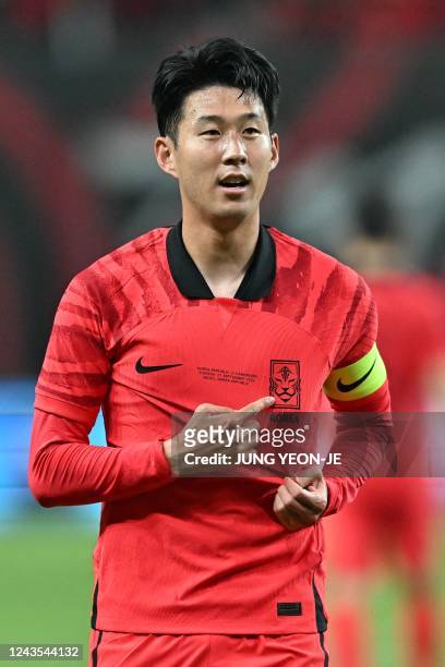 South Korea's Son Heung-min celebrates his goal against Cameroon during a friendly football match between South Korea and Cameroon in Seoul on...