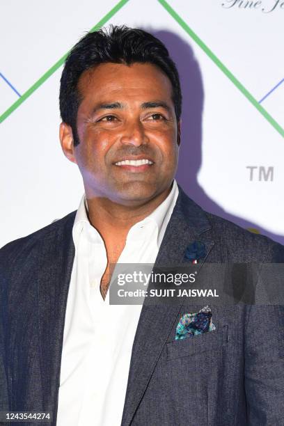 Indian former tennis player Leander Paes poses for pictures as he attends the players auction of the 4th edtion of the Tennis Premier League , in...