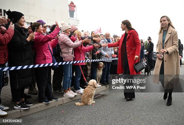 Prince William, Prince of Wales and Catherine, Princess of Wales during their visit to the RNLI Holyhead Lifeboat Station, during a visit to Wales on...