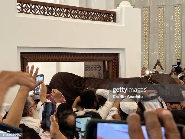 People carry the coffin of Chairman of the International Union of Muslim Scholars Yusuf al-Qaradawi during his funeral atââââââ Imam Muhammad bin...