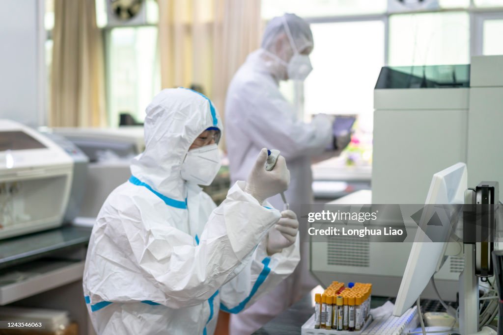 Lab Testing Asia Two Asian Male Doctors Do Tests In The Laboratory High-Res Stock Photo ...
