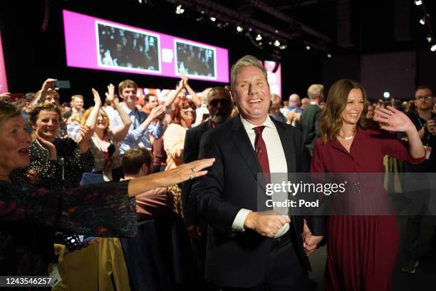 Labour Party leader Keir Starmer with his wife Victoria leave the stage after holding his key note speech on the third day of the annual Labour Party...