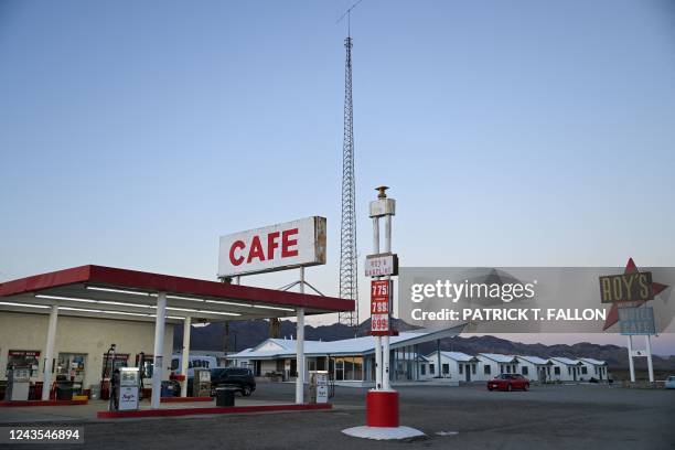 This photograph taken on August 30, 2022 along the former Route 66 in the Mojave Desert city of Amboy, California, US, shows the Roy's Motel, Cafe,...