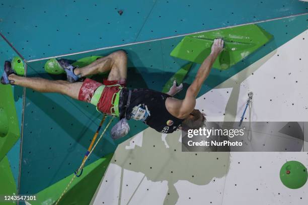 Sebastian Halenke of Germany climbs as he competes during the final men's lead discipline International Federation of Sport Climbing World Cup on...