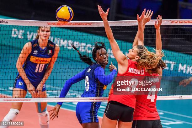 Belgium's Britt Herbots, Belgium's Nathalie Lemmens and Italy's Paola Ogechi Egonu pictured in action during a volleyball game between Belgian...