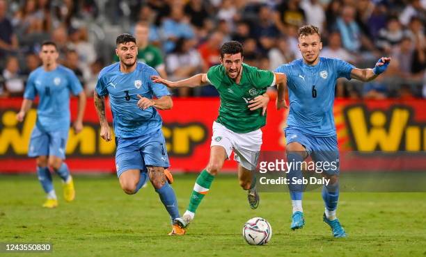 Tel Aviv , Israel - 27 September 2022; Finn Azaz of Republic of Ireland in action against Ziv Morgan, left, and Eden Karzev of Israel during the UEFA...