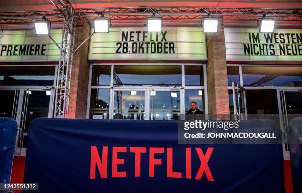 Netflix logo is seen at the opening of the German Netflix film "All Quiet on The Western Front" at the Kino International movie theatre in Berlin on...
