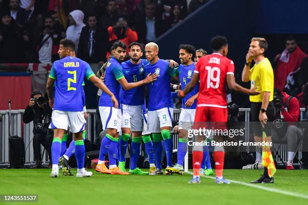 Of Brazil celebrates his goal with team mates during the International Friendly match between Brazil and Tunisia at Parc des Princes on September 27,...