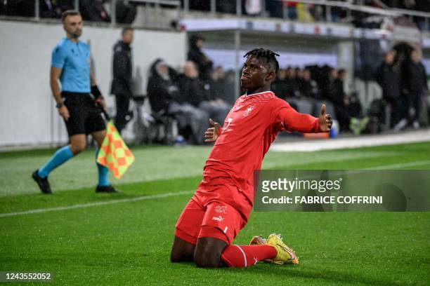 Switzerland's forward Breel Embolo celebrates scoring the 2-0 goal during the UEFA Nations League League A group 2 football match between Switzerland...