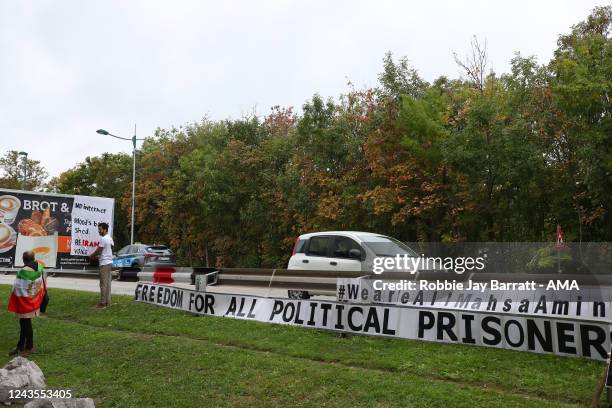 Fans of Iran protest outside the stadium following recent events in their home county surrounding the death of Masha Amini ahead of the International...