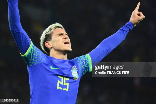Brazil's forward Pedro celebrates scoring his team's fifth goal during the friendly football match between Brazil and Tunisia at the Parc des Princes...