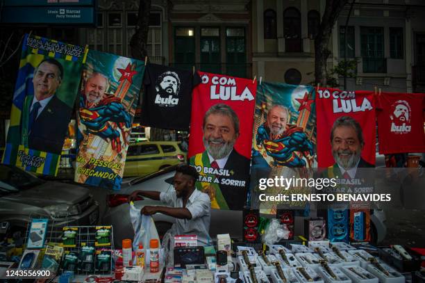 Man sells towels with the image of Brazilian President and re-election candidate Jair Bolsonaro and Brazilian former President and presidential...