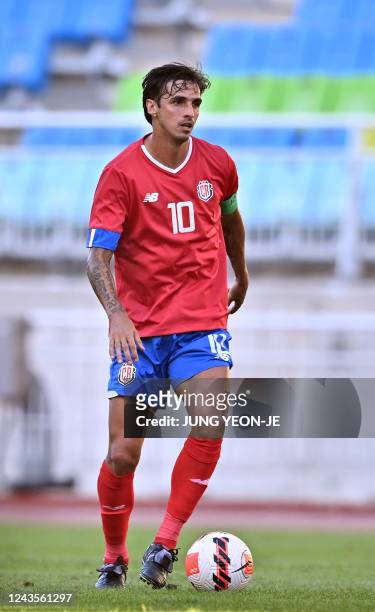 This picture taken on September 27, 2022 shows Costa Rica's Bryan Ruiz controling the ball during a friendly football match between Uzbekistan and...