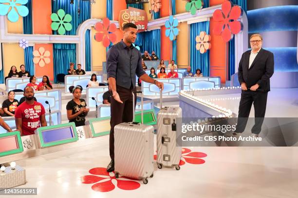 Coverage of the CBS Original Daytime Series THE PRICE IS RIGHT, scheduled to air on the CBS Television Network. Pictured: Devin Goda and Drew Carey.