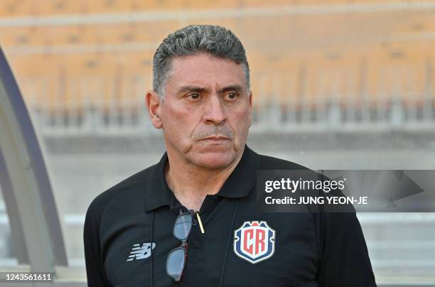 This picture taken on September 27, 2022 shows Costa Rica's head coach Luis Fernando Suarez standing prior to a friendly football match between...