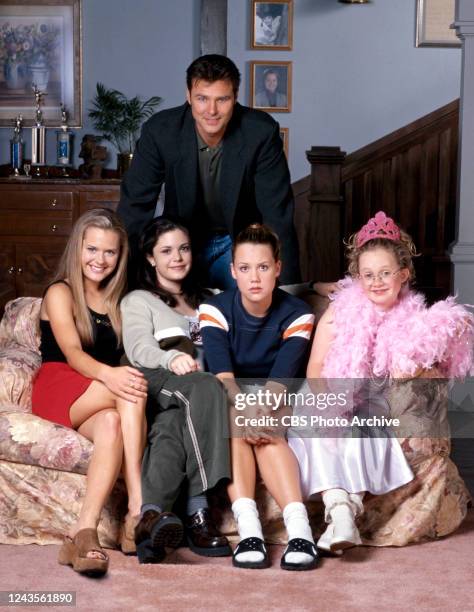 Family Rules. A UPN television situation comedy. Premiere episode broadcast March 9, 1999. Standing is Greg Evigan . Seated, left to right, Maggie...