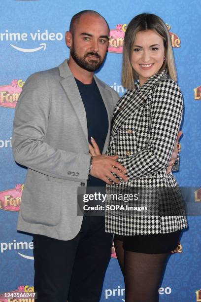 Salvatore Garma and Anna Flavo attend the Me contro te "La famiglia reale" Prime TV series blue carpet at The Space Moderno Cinema.
