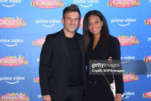 Marco Maddaloni and his wife Romina Giamminelli attend the Me contro te "La famiglia reale" Prime TV series blue carpet at The Space Moderno Cinema.