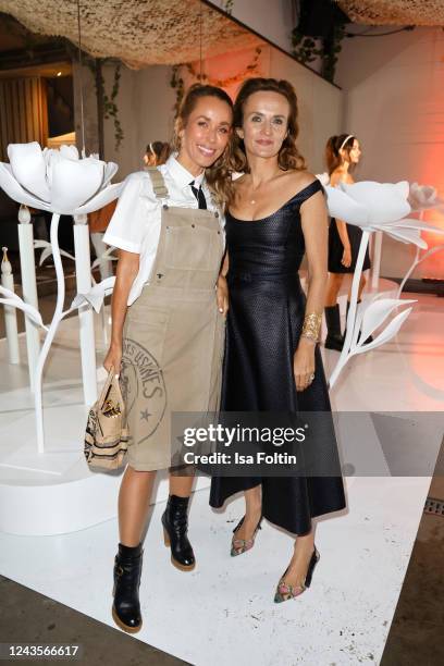 Annemarie Carpendale and Carola Graser-Kraus attend the "J'adore Parfum d'eau" by Dior launch at Prince Charles on September 27, 2022 in Berlin,...