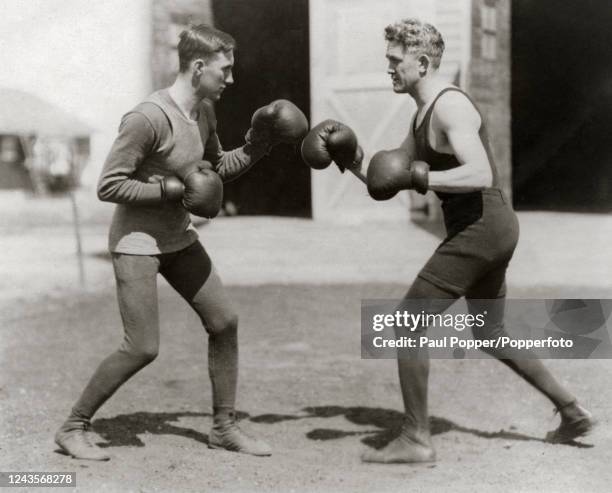 Featherweight boxer Johnny Kilbane sparring with Alf Ziemer in preparation for his title bout against Eugene Criqui, the European champion. Circa...