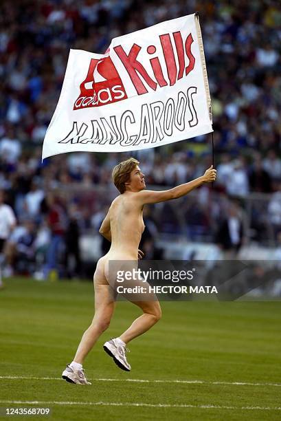 Streaker protesting the Adidas sports company runs through the pitch during the FIFA 2003 Women's World Cup semi-final soccer match between the USA...