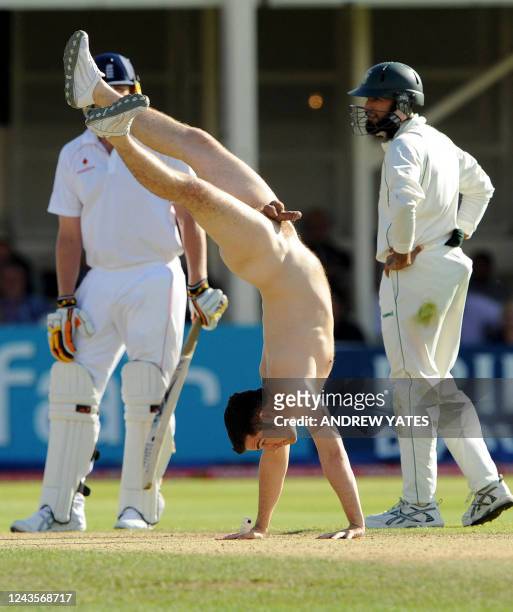 Streaker invades the pitch during the third day of the third test cricket match between England and South Africa at Edgbaston, Birmingham, central...