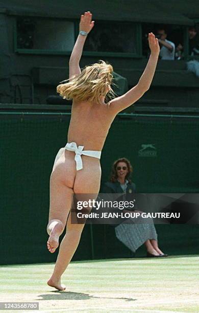 Streaker runs across Center Court, just before the men 's singles final between unseeded Richard Krajicek of the Netherlands and MaliVai Washington...