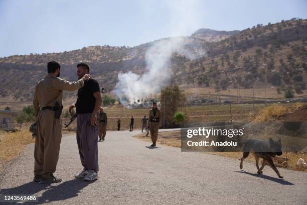 Smoke rises over the headquarters following an attack in the Koy Sanjaq district of Erbil, Iraq on September 28, 2022. Iran's powerful Islamic...