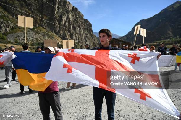 Georgian activists protest against mass immigration from Russia at the Kazbegi / Verkhniy Lars border crossing point between the two countries on...