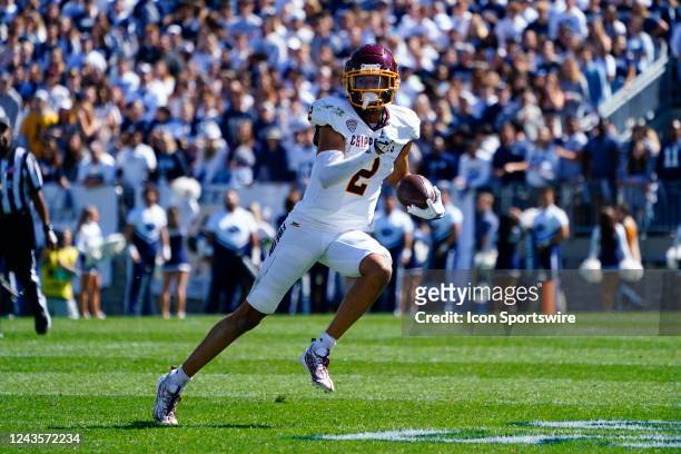 Central Michigan Chippewas Wide Receiver Caroles Carriere runs with the ball after making a catch during the first half of the college football game...