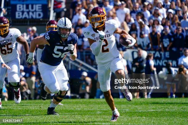 Central Michigan Chippewas Wide Receiver Caroles Carriere runs with the ball after making a catch with Penn State Nittany Lions Defensive Tackle...