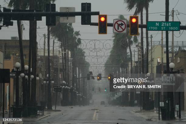 Wind and rain pick up in the Ybor City neighborhood ahead of Hurricane Ian making landfall on September 28, 2022 in Tampa, Florida. - Ian intensified...