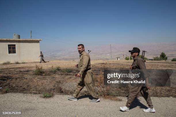 Komala members scouting the targeted areas around their headquarters. Iranian missiles and drones struck multiple headquarters of Kurdish opposition...