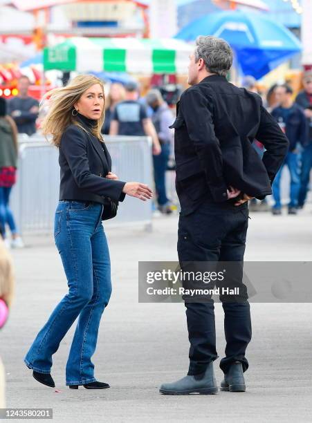 Jennifer Aniston and Jon Hamm are seen filming "The Morning Show" at Coney Island on September 28, 2022 in New York City.