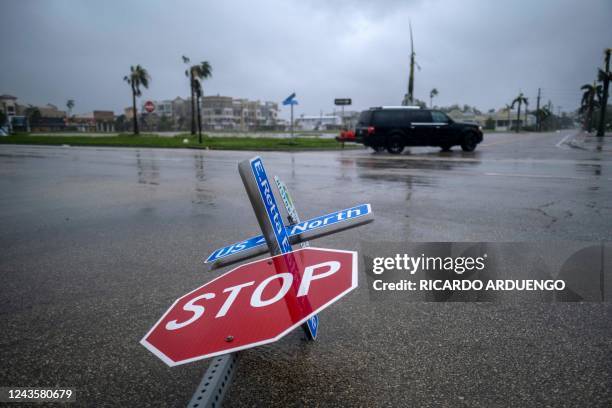 Blown down street sign is seen as the eye of Hurricane Ian passes by in Punta Gorda, Florida on September 28, 2022. - Hurricane Ian slammed into...